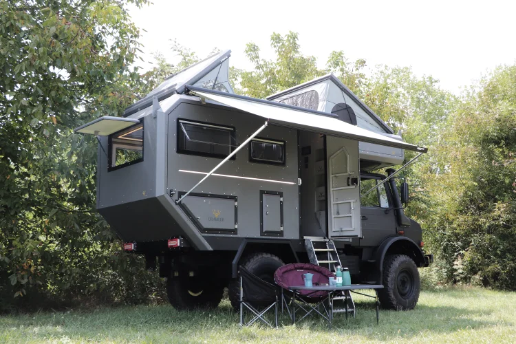 Crawler OTAG 385 — camp set-up with pop-up roof and awning open